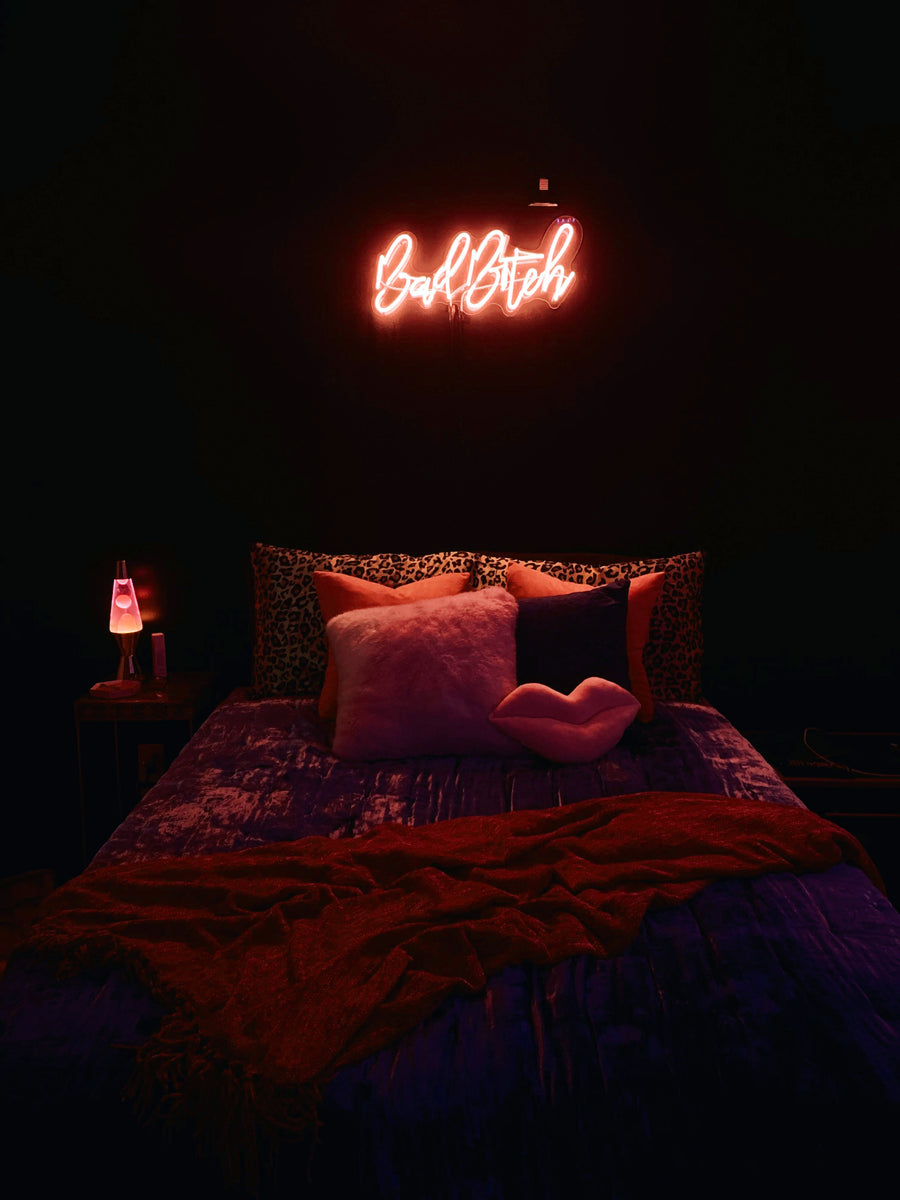 Neon sign over bed