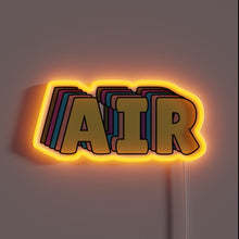 Load image into Gallery viewer, Alt text: "Neon sign featuring the word 'AIR' in bold, multi-layered block letters with a glowing orange outline and colorful 3D shadow effect."