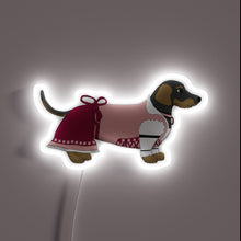 Load image into Gallery viewer, Bavarian-inspired collectible dog figurine with vibrant neon LED lighting accents
