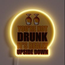 Load image into Gallery viewer, Neon beer sign with upside-down letters in vibrant RGB colors