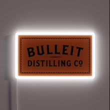 Load image into Gallery viewer, Neon Lit Sign Featuring Bulleit Distilling Co's Iconic Bourbon Logo