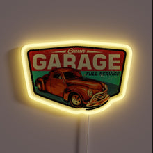 Load image into Gallery viewer, Vintage garage neon sign with classic red car and yellow glow.