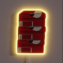 Load image into Gallery viewer, Sneakerhead vibes only 🏆🔥 — this glowing stack of classic red Nike shoe boxes brings that collector’s energy to your wall. Perfect for your sneaker room, man cave, or content studio!