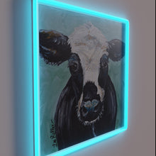 Load image into Gallery viewer, Neon bovine art statement with vibrant Maybelline inspired RGB glow