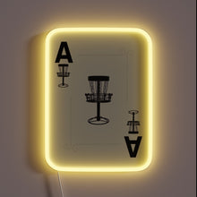 Load image into Gallery viewer, Disc golf-themed poker card night illuminated by colorful neon signage