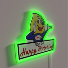 Load image into Gallery viewer, Vintage Esso Happy Motoring Boy in RGB neon lighting ambiance.