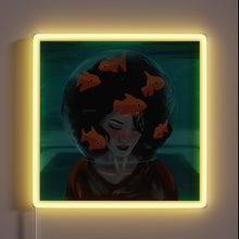 Load image into Gallery viewer, Glowing LED neon sign featuring colorful 'Going Under' lettering