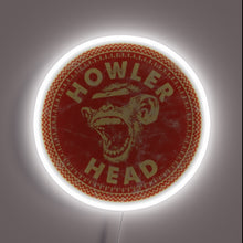 Load image into Gallery viewer, Howler Head Whiskey neon sign with a bold red circular design featuring a roaring monkey and white neon glow outlining the logo.