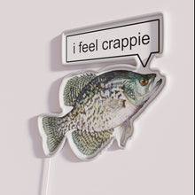 Load image into Gallery viewer, Brightly lit 'I Feel Crappie' humor neon wall decor sign