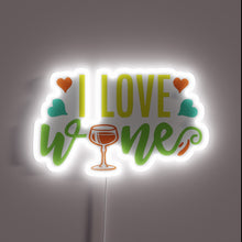 Load image into Gallery viewer, I Love Wine" in bold, colorful, glowing RGB neon letters.