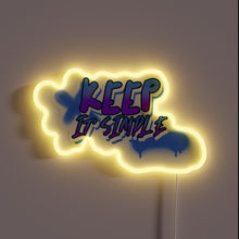 Load image into Gallery viewer, Vibrant RGB LED neon sign with minimalist 'Keep It Simple' design