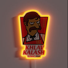 Load image into Gallery viewer, Electric glow of vibrant colors with radiant Khlav Kalash branding.