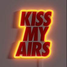 Load image into Gallery viewer, Bold red "KISS MY AIRS" text in neon with a glowing yellow outline.