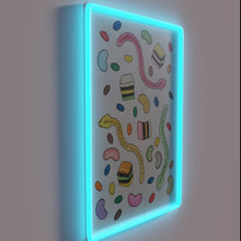 Load image into Gallery viewer, Vibrant RGB lighting illuminates a colorful lollies theme neon sign.