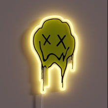 Load image into Gallery viewer, Neon sign of a green melting face with X eyes and a frown.