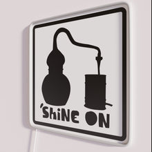 Load image into Gallery viewer, Add radiant neon ambiance with vintage-style Moonshine Alembic Shine On sign.