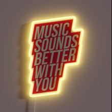 Load image into Gallery viewer, "Music Sounds Better With You" red neon sign in bold lightning bolt shape.