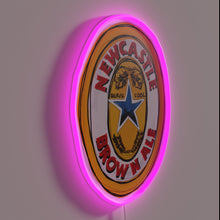 Load image into Gallery viewer, Neon wall art featuring iconic Newcastle Brown Ale logo design.