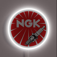 Load image into Gallery viewer, Red NGK spark plugs neon sign with bold white lettering and spark plug graphic.