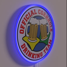Load image into Gallery viewer, Vibrant RGB neon sign: Official Cornhole Drinking Team branding statement.