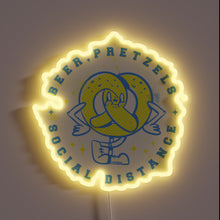 Load image into Gallery viewer, COVID-19 safety precautions meet traditional Oktoberfest flair in neon lights.