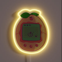 Load image into Gallery viewer, Retro meets cute with this peachy **Tamagotchi neon sign** – a glowing throwback for lovers of pixel pets and nostalgic vibes.