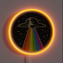 Load image into Gallery viewer, This neon sign features a retro UFO beaming down a rainbow — the perfect blend of sci-fi vibes and **pride celebration**. A bold and colorful statement piece for anyone who wants their wall art to scream *"queer, cosmic, and proud."* 🌈🛸