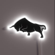 Load image into Gallery viewer, Neon sign of a charging black bull silhouette outlined in white.