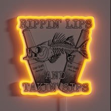 Load image into Gallery viewer, Eye-catching RGB Neon Sign with Rippin Lips Customizable Artwork Display.
