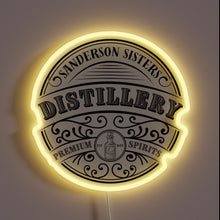 Load image into Gallery viewer, Vibrant RGB glow illuminates Sanderson Sisters Distillery logo with eerie charm.
