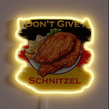Load image into Gallery viewer, Vibrant Neon Sign Displaying Color-Changing Schnitzel Logo Design