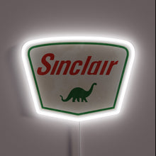 Load image into Gallery viewer, Retro-inspired Sinclair Oil vintage logo in vibrant essential RGB neon.