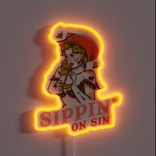 Load image into Gallery viewer, Sultry cowgirl sips cocktail under neon lights in vibrant colors
