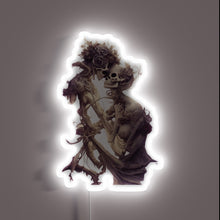Load image into Gallery viewer, Whimsical Neon Sign Featuring a Lovable Ghostly Skeleton Couple Together.