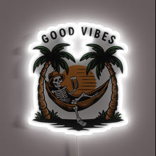 Load image into Gallery viewer, Spooky Skeleton Finds Chill Good Times under Neon Glow Sign