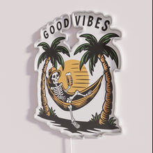 Load image into Gallery viewer, Colorful Neon Sign with Skeleton Relaxing in Hammock Drinking Beer.