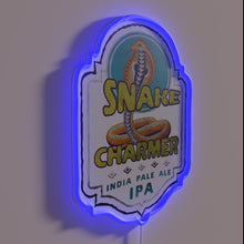Load image into Gallery viewer, Add mystique to your space with this snake charmer sign.