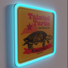 Load image into Gallery viewer, Neon art featuring iconic Tainted Turtle bar and McConnell Brewery logo.
