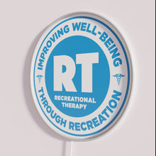 Load image into Gallery viewer, RGB Neon Sign Honoring Therapeutic Recreational Therapy Professionals Everywhere