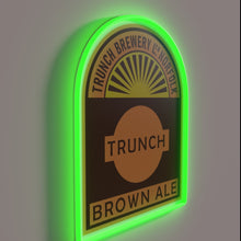 Load image into Gallery viewer, Glowing RGB neon beer sign featuring Trunch Brown Ale logo