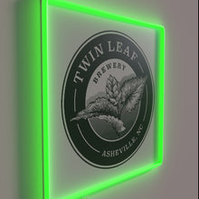 Load image into Gallery viewer, Vibrant RGB neon sign featuring Twin Leaf Brewery's iconic logo.