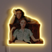 Load image into Gallery viewer, This neon sign features a scene from the 1999 teen romantic comedy *10 Things I Hate About You*, starring Heath Ledger and Julia Stiles. It&#39;s a modern adaptation of Shakespeare’s *The Taming of the Shrew*, and this image captures the chemistry between the lead characters, Patrick and Kat, in one of the film’s iconic promotional shots.