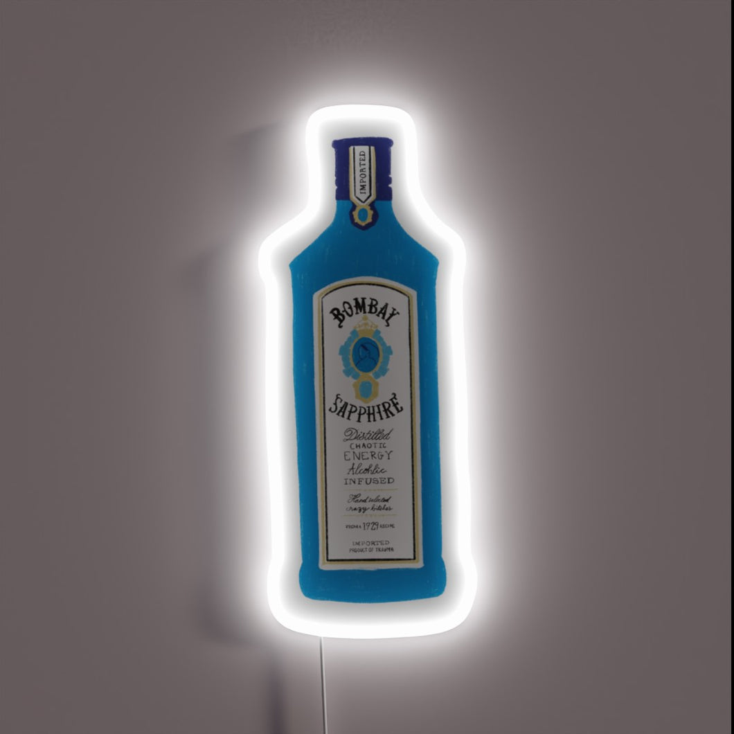 Neon sign shaped like a blue Bombay Sapphire bottle with white glow.