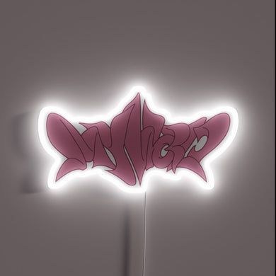 Aespa's vibrant pink neon logo shines brightly in the darkness
