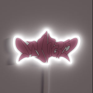 Aespa's vibrant pink neon logo shines brightly in the darkness