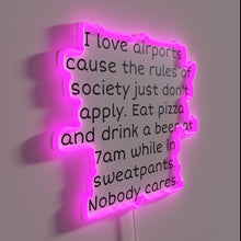 Load image into Gallery viewer, Air travel vibes illuminated in bold, colorful RGB neon letters