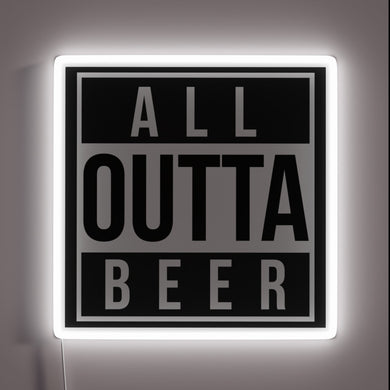 Fun neon bar decoration with a humorous beer shortage message.