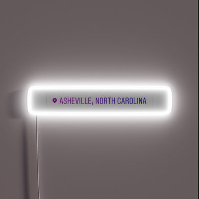 Vibrant Neon Sign Illuminating 'Asheville' in Rich RGB Color
