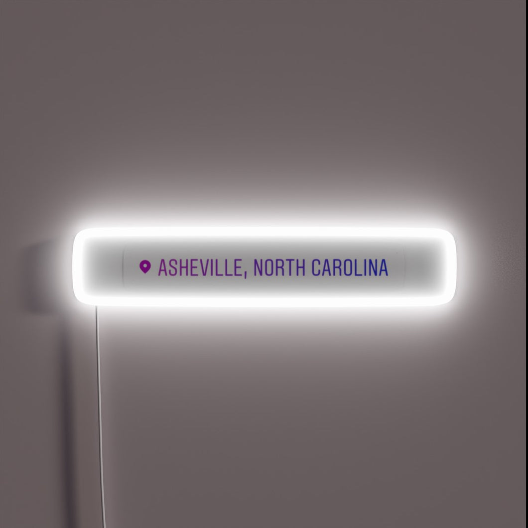Vibrant Neon Sign Illuminating 'Asheville' in Rich RGB Color