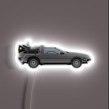 Load image into Gallery viewer, Back to the Future neon sign – featuring the iconic DeLorean time machine in sleek profile. A must-have wall piece for 80s fans, retro movie lovers, and sci-fi collectors.